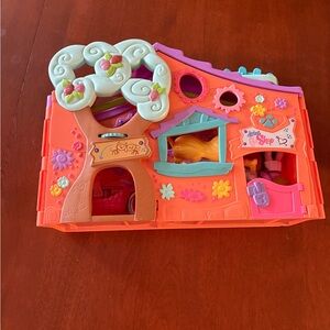 Whimsical Orange and Pink Playhouse for Kids
